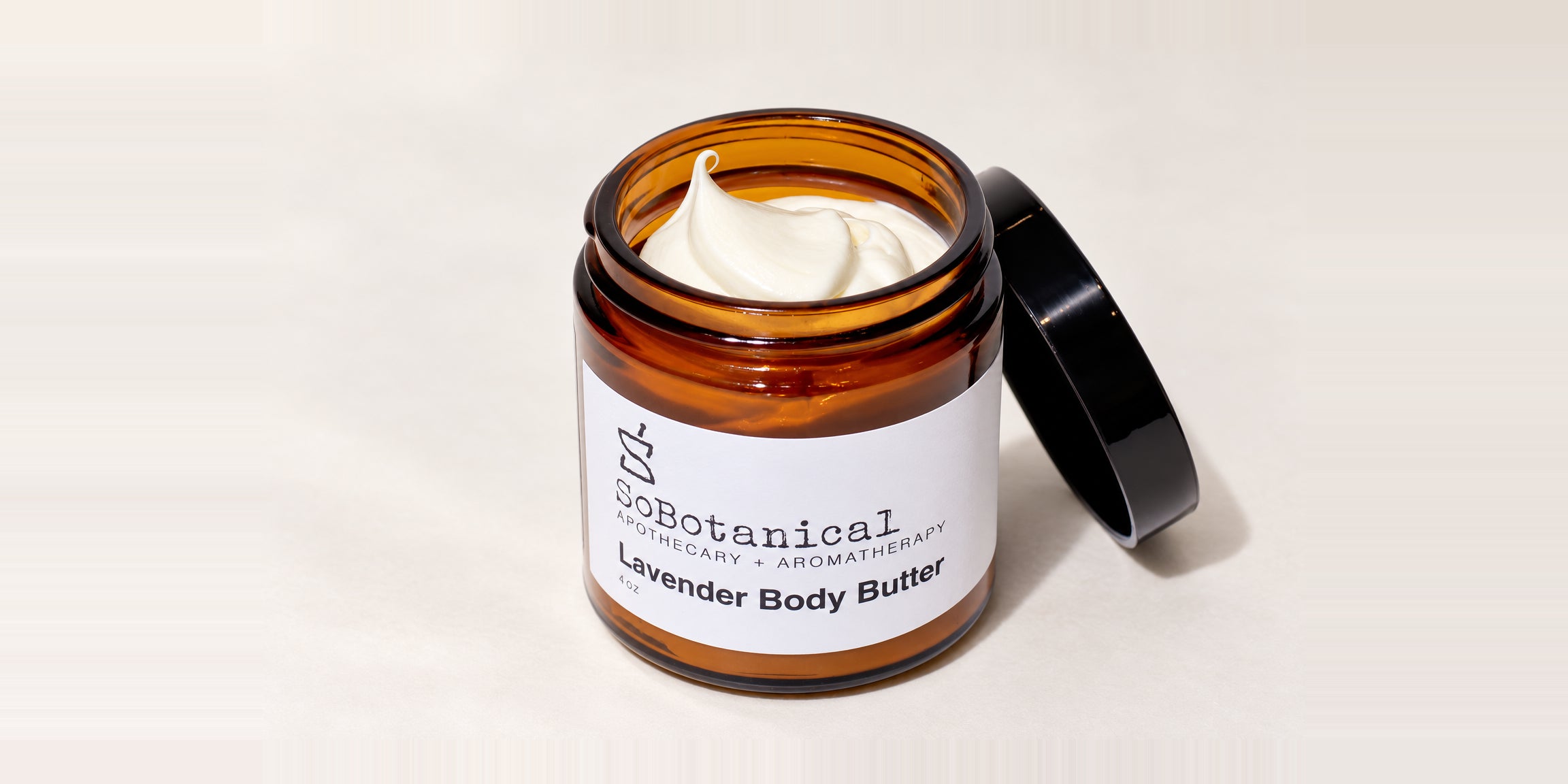 Open Lavender Body Butter jar with a soft whipped butter peak